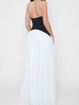 Model wearing Harlowe Contrast Corset Maxi Dress in White, back view.