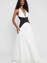 Model wearing Harlowe Contrast Corset Maxi Dress in White, side view.
