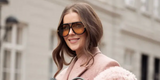 Norwegian fashion influencer Nina Sandbech was seen wearing black Bottega Veneta BV1273S 003 Drop Aviator sunglasses with yellow lenses during the Copenhagen Fashion Week Fall/Winter 2025